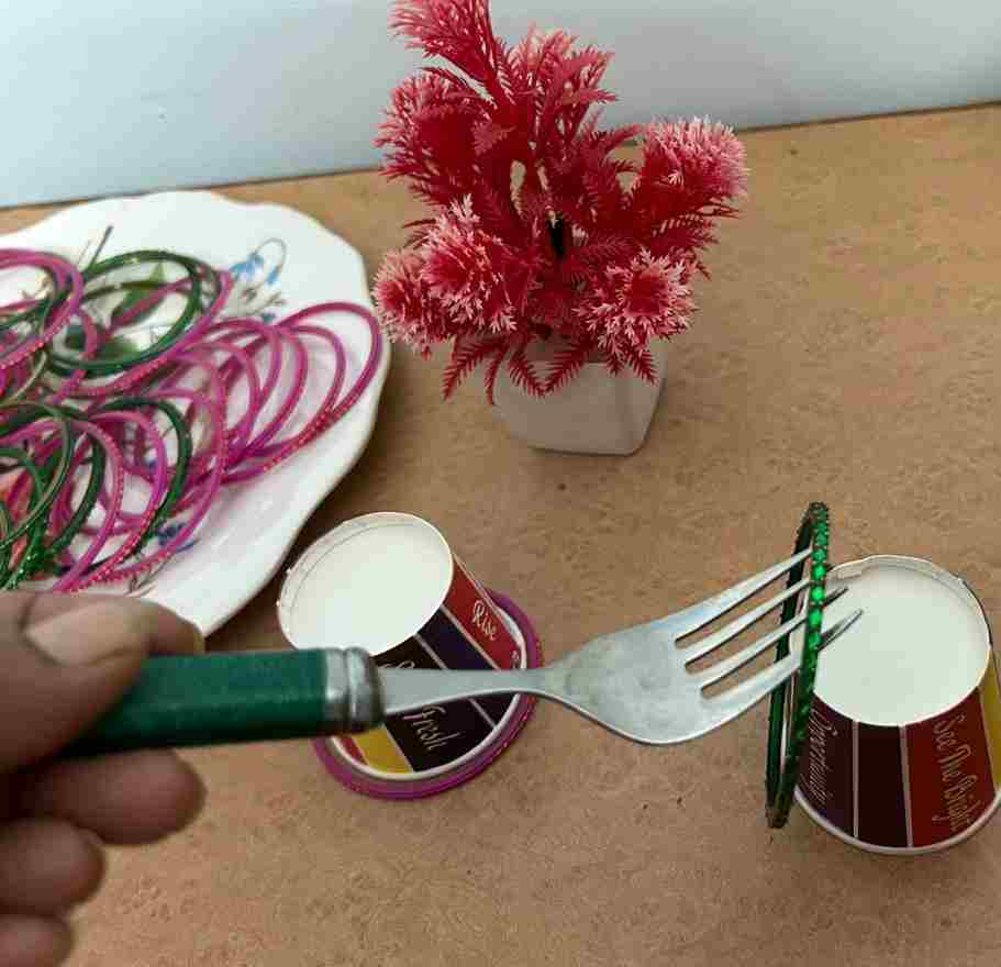 place bangles with fork